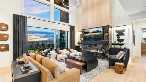 Stunning 2-story great room with stacked doors to covered patio