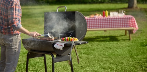 Man grilling food outdoors