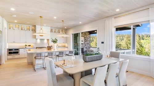 The gourmet kitchen of the Quinault provides connectivity to the casual dining area with prime access to the covered deck