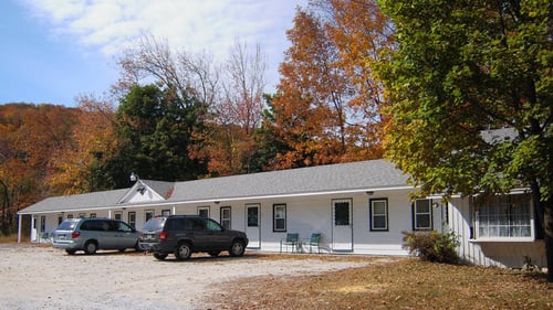 white exterior of lodge