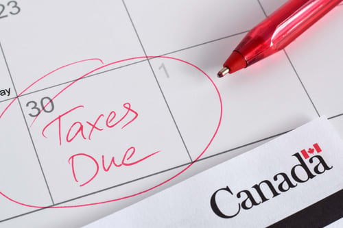 calendar with the words "taxes due" and circled on the 30th of April.