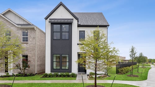 Exterior of the Normandy Homes model home at Twin Creeks Watters in Allen, TX.