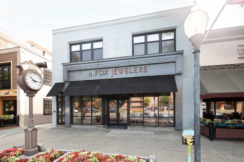 Entrance and signage for N. Fox Jewelers in downtown Saratoga Springs.