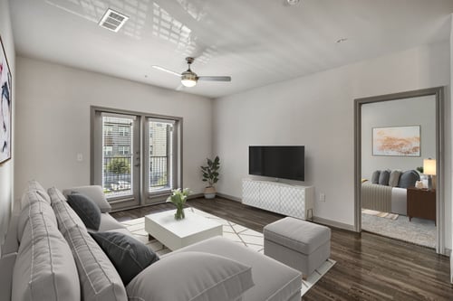 Living room with TV and balcony