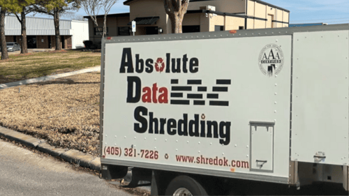 Absolute Data Shredding's Tulsa location with a mobile shredding truck parked in front