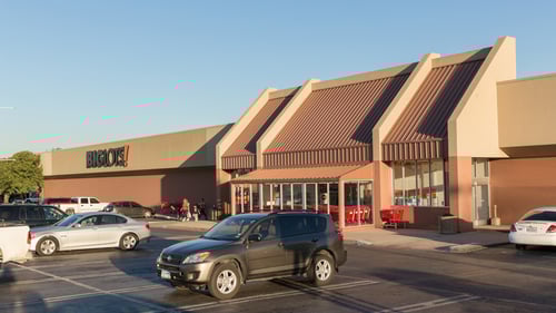 cars sporadically parked in lot in front of Big Lots entrance at Stevens Park Village shopping center