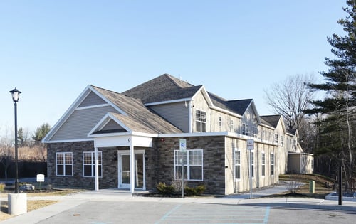 House Exterior with Parking Lot at Iroquois Village, New York, 12309
