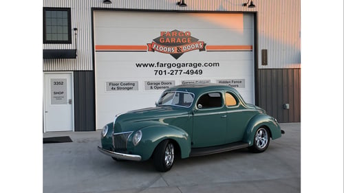 Fargo Garage Front of Building with green studebaker