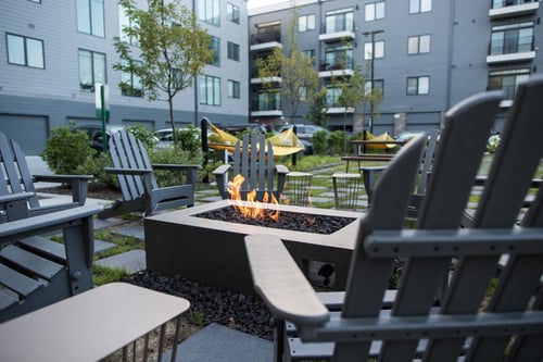 Firepit outside at Pinnex Apartments in Indianapolis, IN 46203