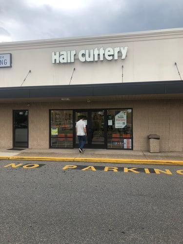The front entrance of Hair Cuttery at Deon Square Shopping Center.
