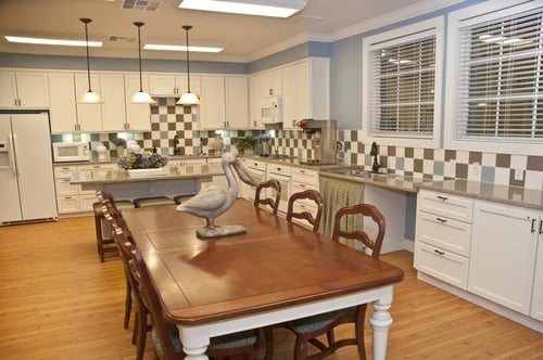 Kitchen and dining area at Belle at Bay Colony 55+ Apartments, Dickinson, 77539