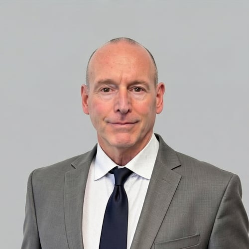 Headshot of Adam Tibbetts, a wealth advisor at Chase