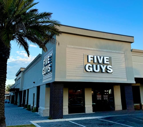 Exterior photograph of the Five Guys restaurant at 4495 Roosevelt Boulevard in Jacksonville, Florida.