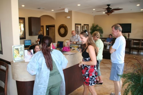 Patients at the front desk of Inland Dental Specialties