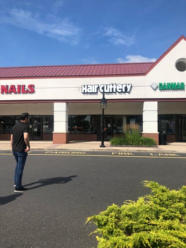 The front entrance of Hair Cuttery at Centre Point Place.