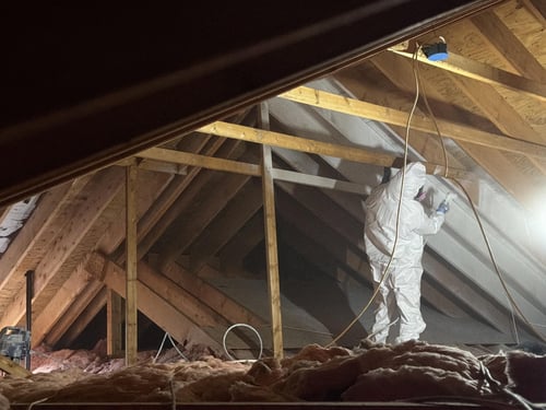 A Restoration 1 of Mt. Pocono technician works in an attic space