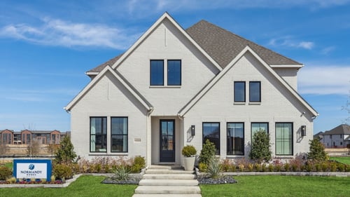 Exterior of the Estates at Stacy Crossing model home in McKinney, TX.