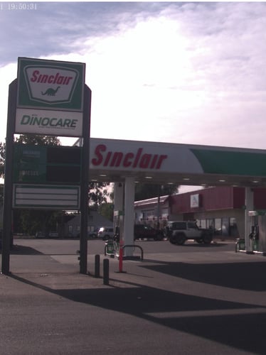 Sinclair gas station fueling island