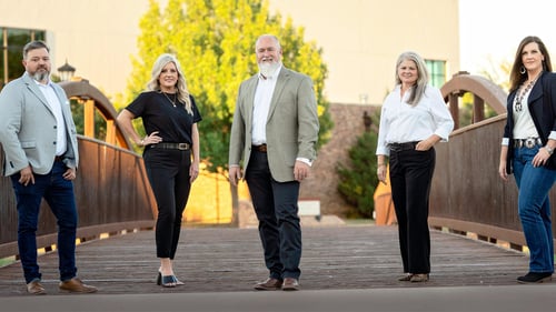 Kelly Fristoe and the Financial Partner's team