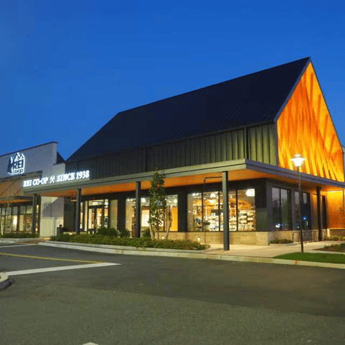 Huntington Station storefront at night
