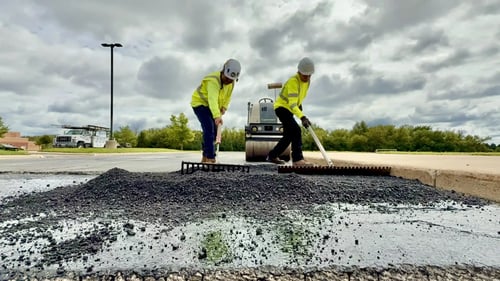 Asphalt pavement raking