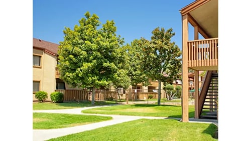 Landscaped apartment courtyard at Woodside Village in West Covina, CA 91792