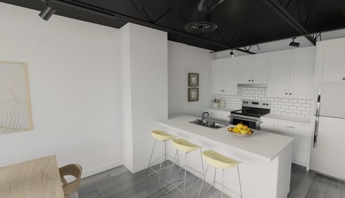 Kitchen area with tile backsplash and center table