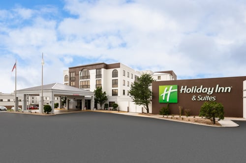 Drive up to the Holiday Inn & Suites with free airport shuttle.