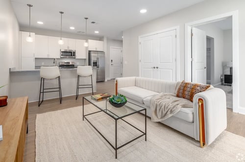 Kitchen and living room at Park Lamont Townhomes in Cleveland, OH 44106