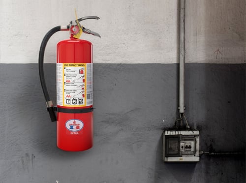 Picture of a fire extinguisher on the wall.