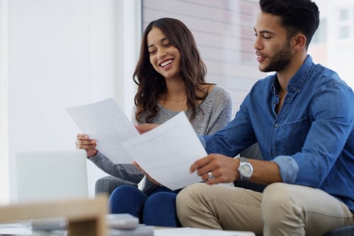 couple reading a report