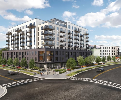 Exterior of multi-story senior living community on the corner of the street