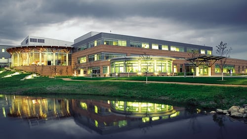 exterior photo at night of the James Beck Cancer Center on the Aspirus Rhinelander Hospital campus