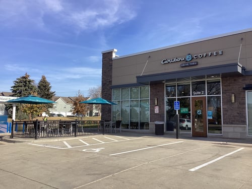 Storefront of the Caribou Coffee at 13250 Grove Drive in Maple Grove