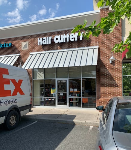 The front entrance of Hair Cuttery at Edinburgh North Shopping Center.