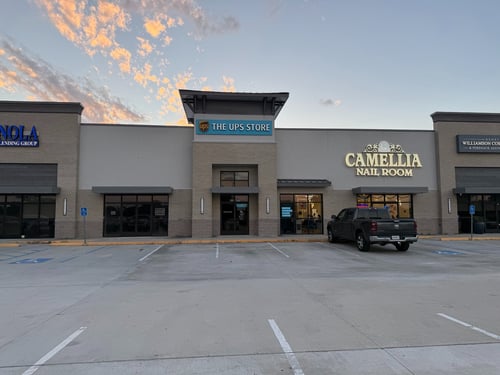 Front entrance of The UPS Store #8259 on Nelson Road in Lake Charles, Louisiana.