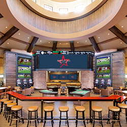 The Sportsbook at Ameristar Black Hawk is your ticket to real odds, point spreads and over/unders.
There’s no better place to place your sports bets! Featuring a 24-foot video wall, 13 betting kiosks, drink specials and 29 HDTVs for viewing the best games — our Sportsbook will have everything you need for a great experience. There’s even your favorite table games, like blackjack and roulette. Plus, we’re the ONLY sportsbook where you can earn PENN cash® and PENN Play® tier points every time you bet!