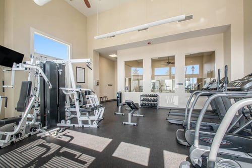 24-Hour Fitness Center with an Interactive Workout Mirror at The Residences at Toscana Park in Granger, IN 46530