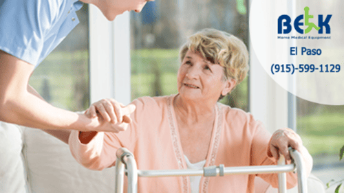 man helping women with walker