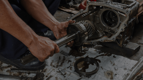 man working on an engine