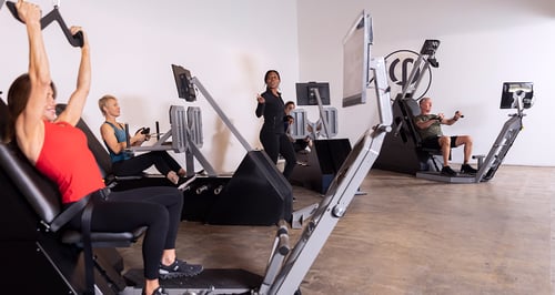 Members working out at a FastFit studio