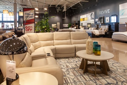 Bloomington Slumberland Furniture white leather sectional with console