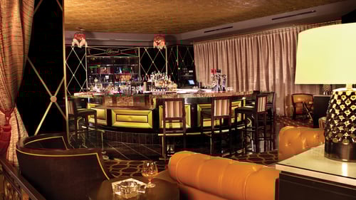 Bound is an elegant lobby bar at The Cromwell Las Vegas with an intimate vibe and a curated selection of craft cocktails and spirits. Try the Bound Old Fashioned or explore some of their other unique offerings to get your evening started. An elegant atmosphere permeates every inch of Bound. Subtle lighting, gold highlights, and plush seating creates an intimate scene while you sip on handcrafted cocktails.