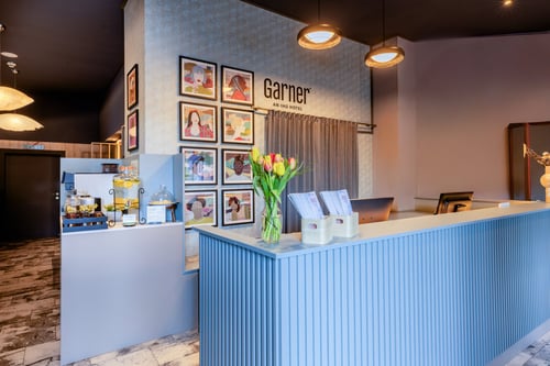 Inviting hotel reception with friendly staff.