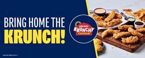 Promotional image for Krispy Krunchy Chicken featuring crispy chicken tenders and nuggets served with dipping sauces and honey biscuits on a wooden board, with text reading “Bring Home the Krunch.”
