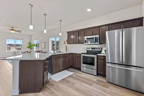 Kitchen area at The Residences Apartments at Bear Tree in DeForest, WI, 53532