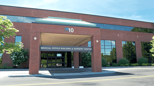 Google Cover Photo image of exterior of Linden Oaks Medical Campus at 10 Hagen Dr. which houses Rochester Regional Health Allergy, Rheumatology & Infusion Center