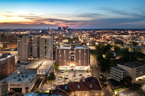 A cityscape with buildings and trees in the background at Tower on Tenth Apartments, Birmingham, AL, 35205