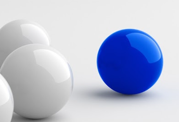 a blue ball and several white balls