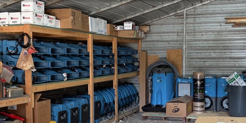 Restoration 1 air movers and dehumidifiers used for containment and drying